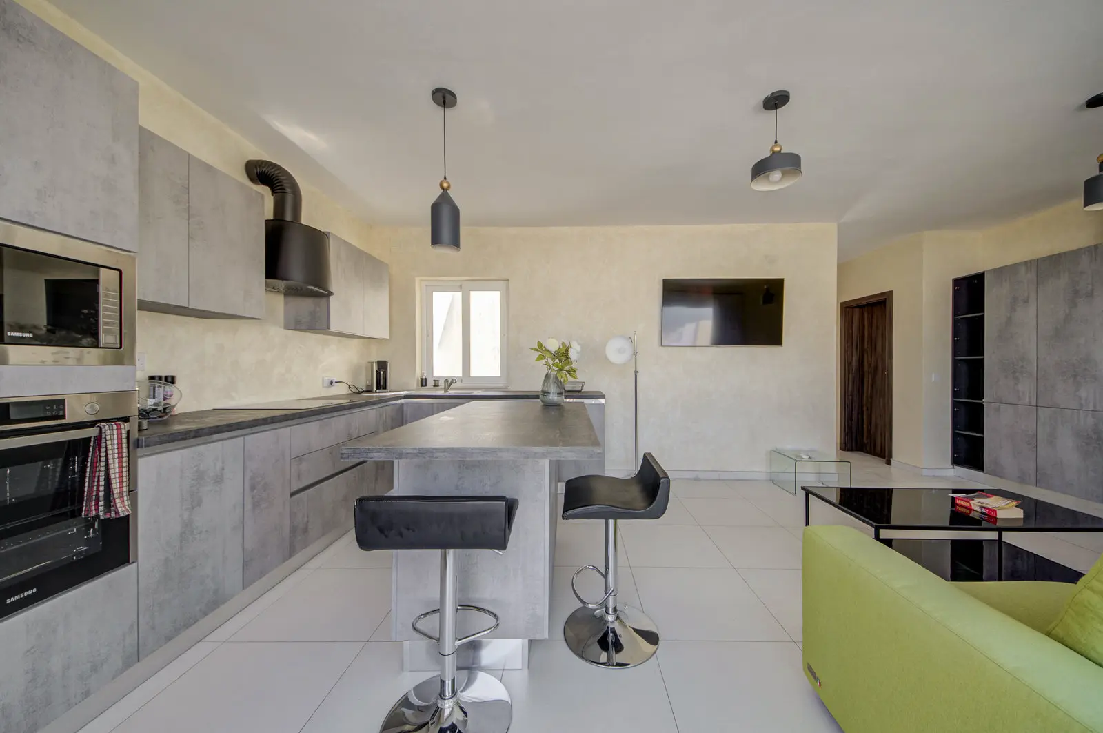 Swieqi Penthouse open-plan kitchen and living area overview